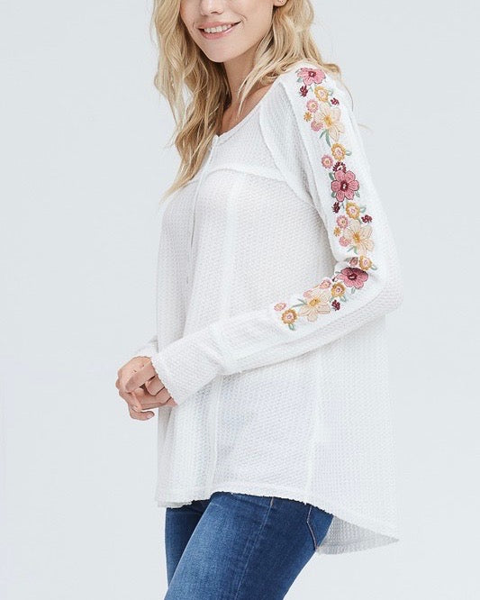 http://www.shophearts.com/cdn/shop/products/waffle_knit_embroidered_long_sleeve_henley_thermal_top_-_ivory_2.jpg?v=1571271513