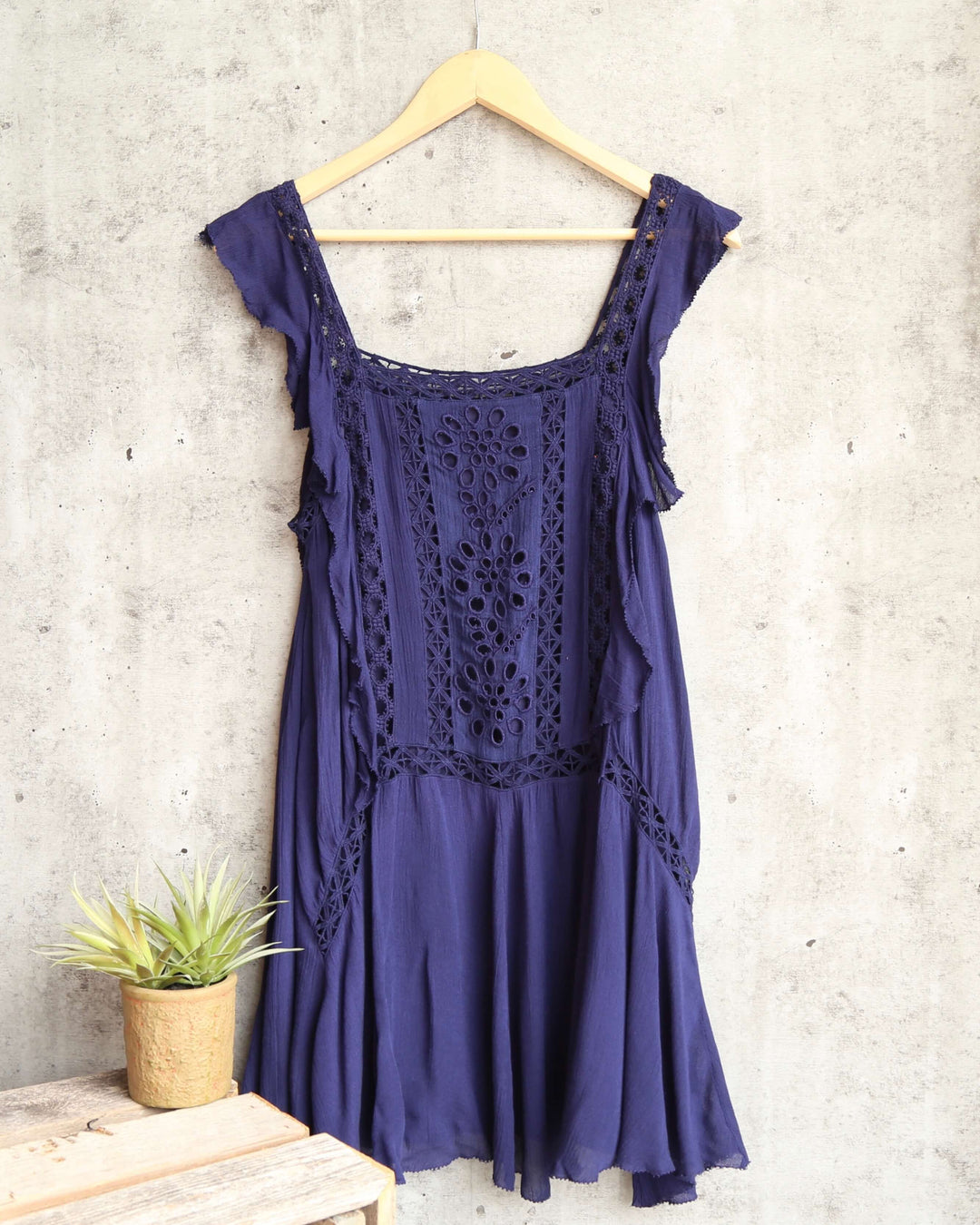 free people - dress - eyelet - crochet - ruffle trim - raw cut edge - asymmetrical - navy