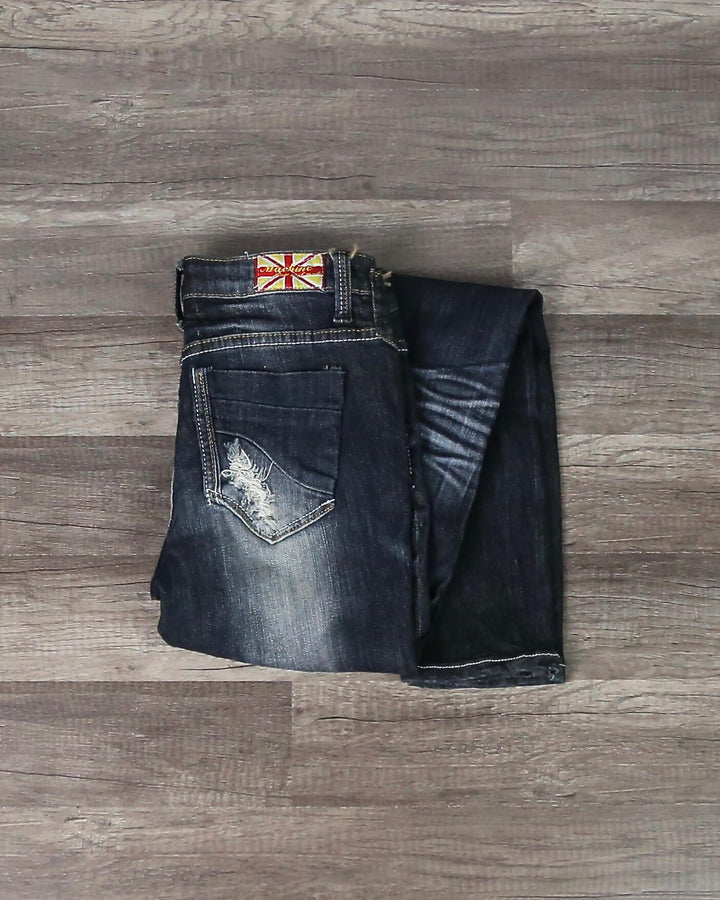 Distressed Skinny Jeans in Dark Denim